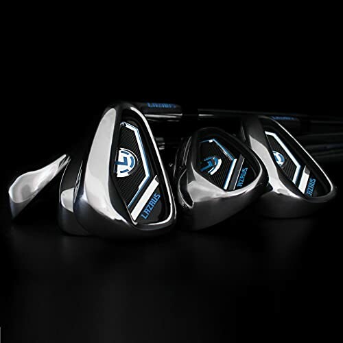 Set of shiny golf clubs on a black background