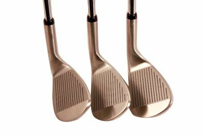 Three golf club heads lined up.